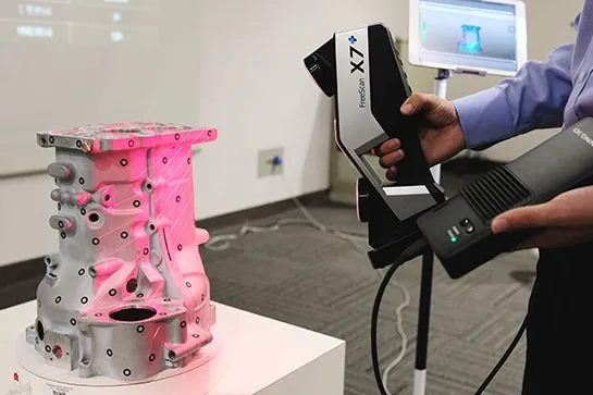 Person soldering a circuit board with focus